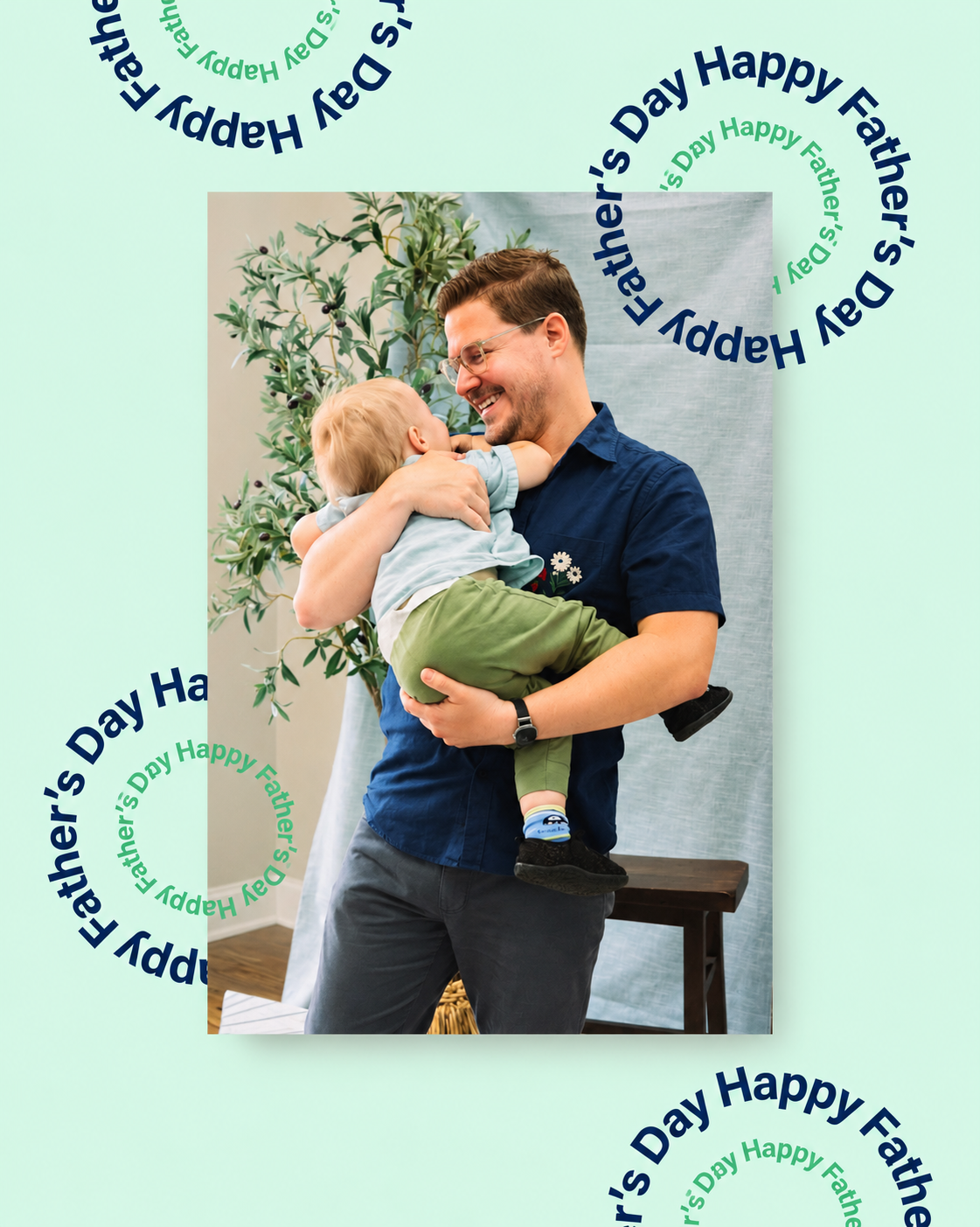 Happy Father's Day photo card of a father hugging his son, framed by circular type on mint green